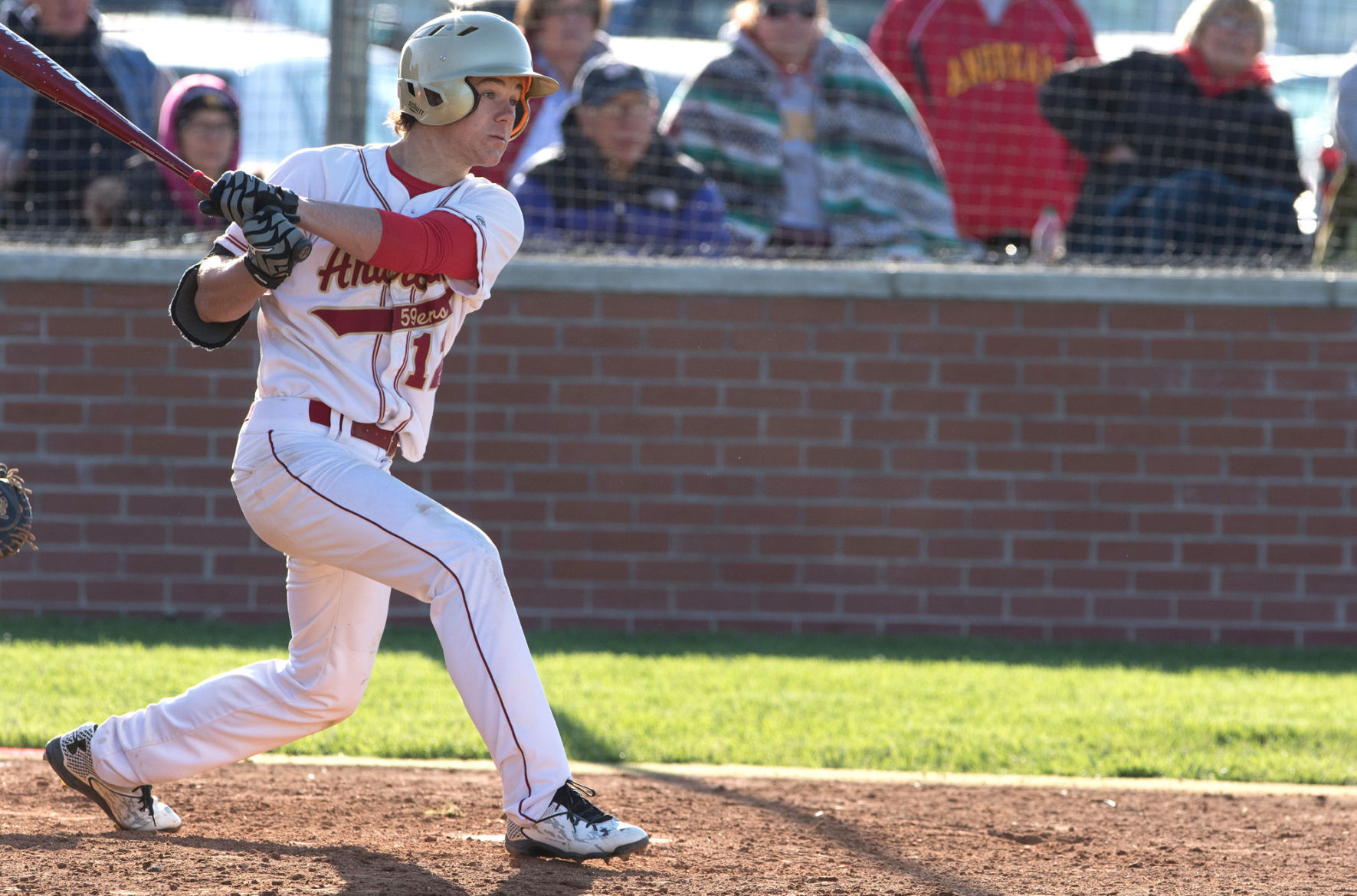 Andrean's Chase Dawson registers a hit (signs)